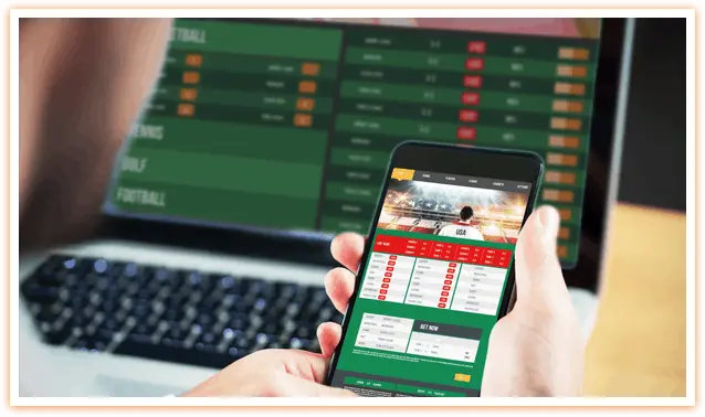 Man Betting on Sports Online